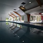 Bosgeluk Alpesi faház *